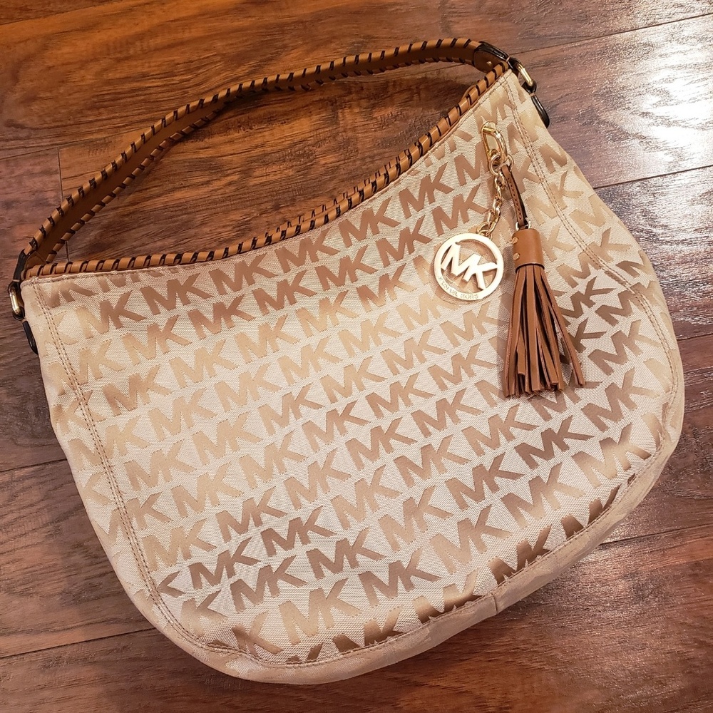 Sold.   Michael Kors